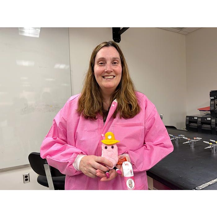 Estrogen plush with pink lab coat