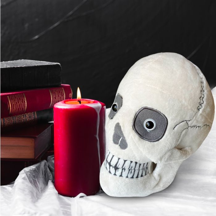 Skull plush with candle