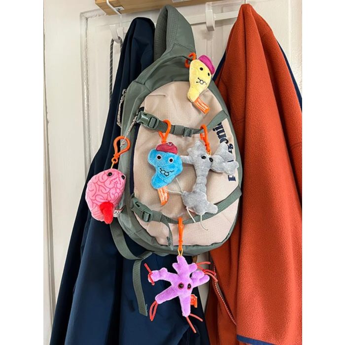 Brain Science key chains on backpack