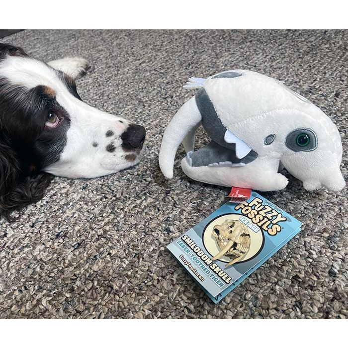 Smilodon plush with dog